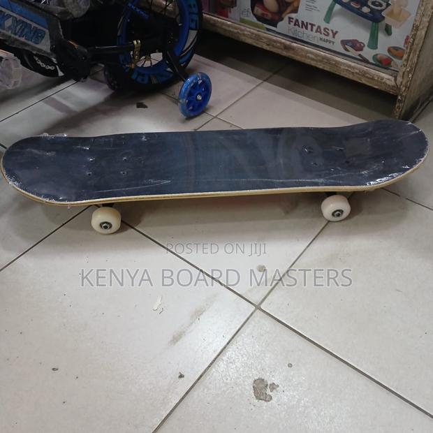 Black Grip Taped Skate Boards and Rubber Wheels