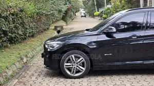 BMW X1 sDrive28i 4dr SUV (2.0L 4cyl Turbo 8A) 2015 Matt Black