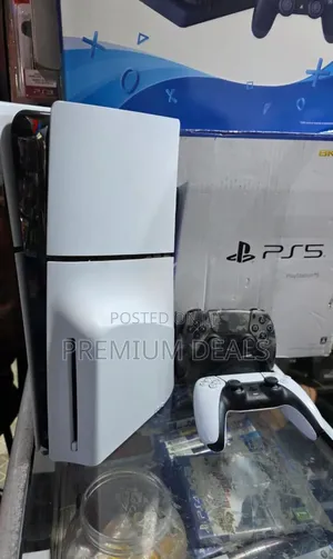 Ps5 Slim Two Controllers and Games.