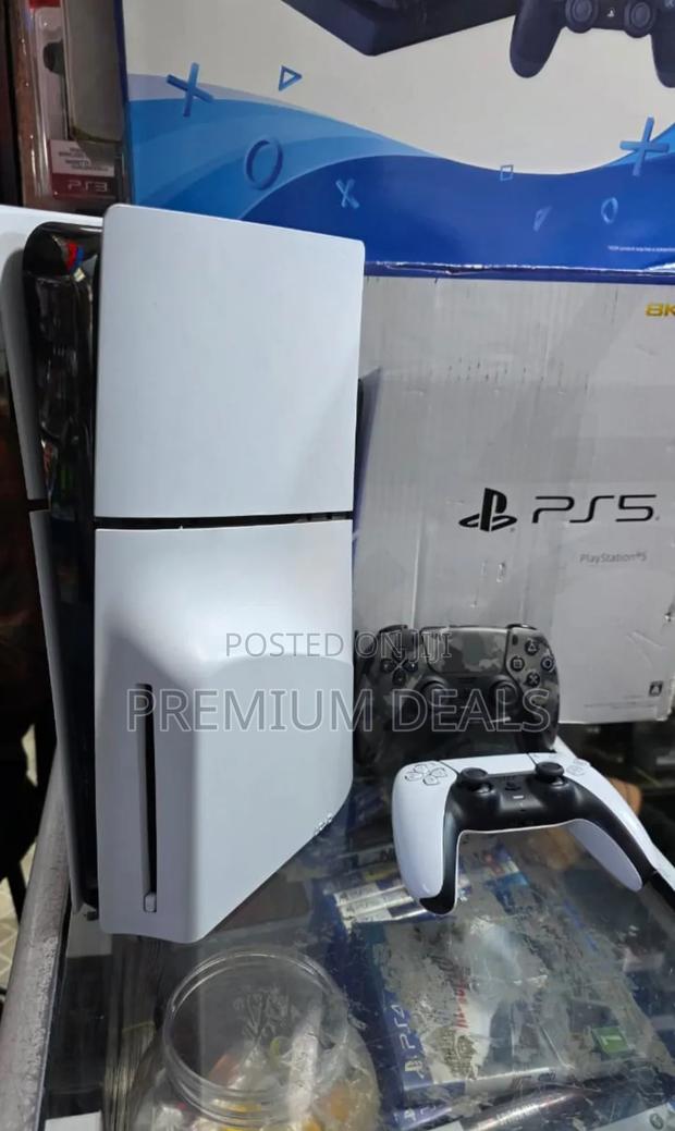 Ps5 Slim Two Controllers and Games.