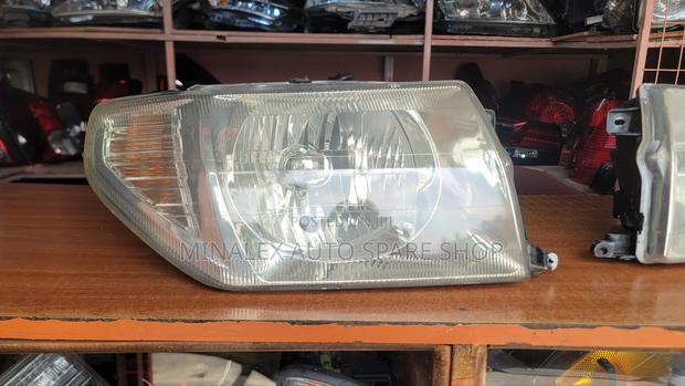 Pajero Io Headlight Complete With Bulbs - main view