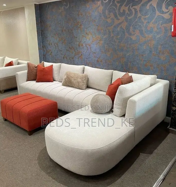 Elegant White 6 Seaters L Shape Sofa With Throw Pillows