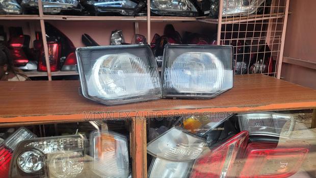 Pajero Simcard Headlight Complete With Bulbs And Sockets - main view