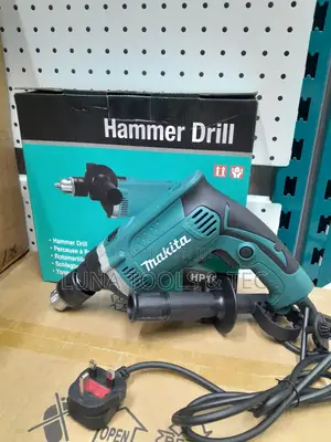 Hammer Drill Makita 710w With a Handle and Chuck Key