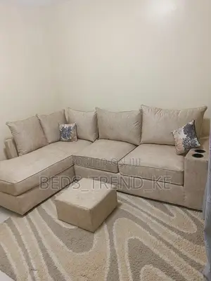 Elegant 6 Seater Decent L Seat Sofa With Cupholders + Puff