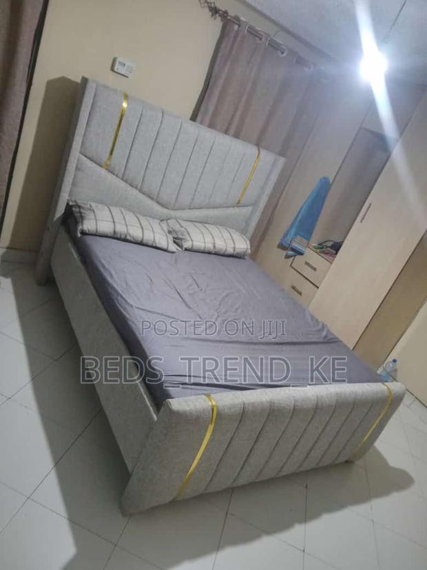 6 by 6 Cozy Bed Design With Golden Lines.