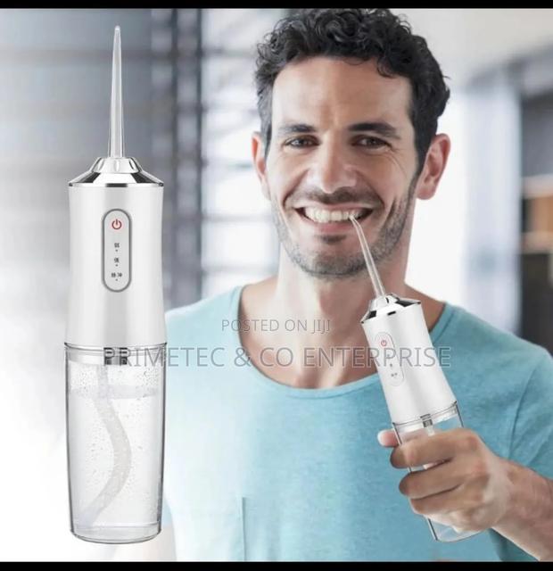 4 Nozzles Oral Irrigator Portable Dental Water Flosser.