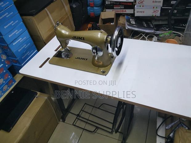 Available Sewing Table + Singer - main view