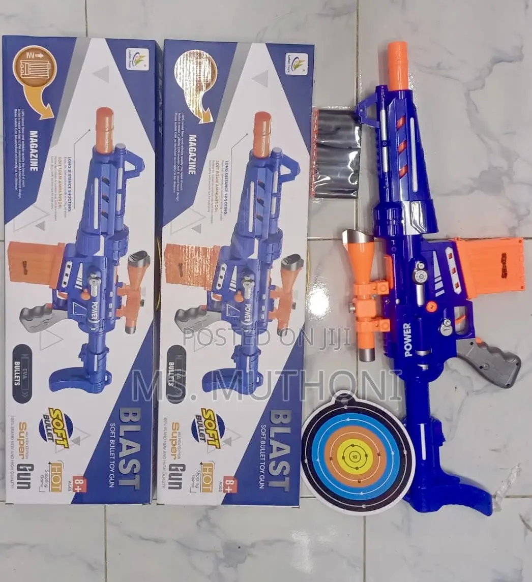 Battery Operated Toy Shooting Gun + 20 Soft Bullets