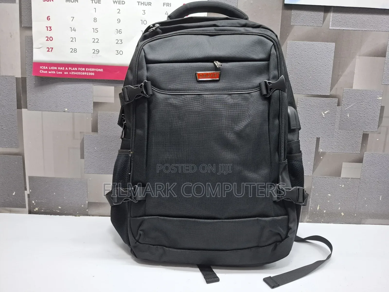 Omaya 17" Faux Leather Backpack