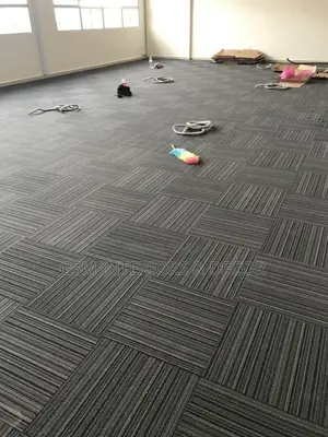Freshly Installed Carpet Tiles Covering Wall to Wall