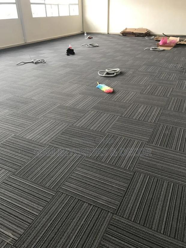 Freshly Installed Carpet Tiles Covering Wall to Wall
