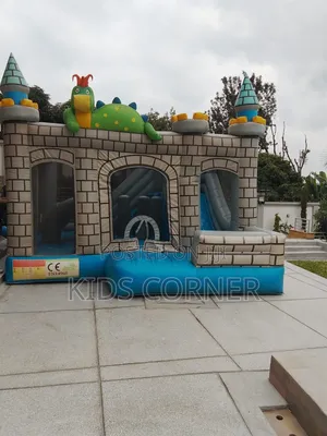 Inflatable Dinousar Bouncy Castle With a Slide