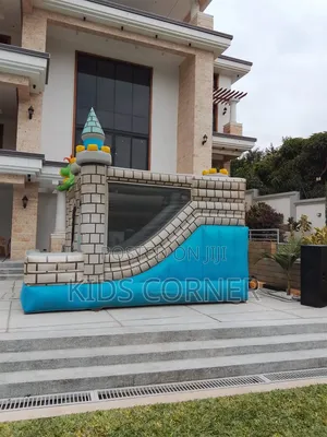 Inflatable Dinousar Bouncy Castle With a Slide