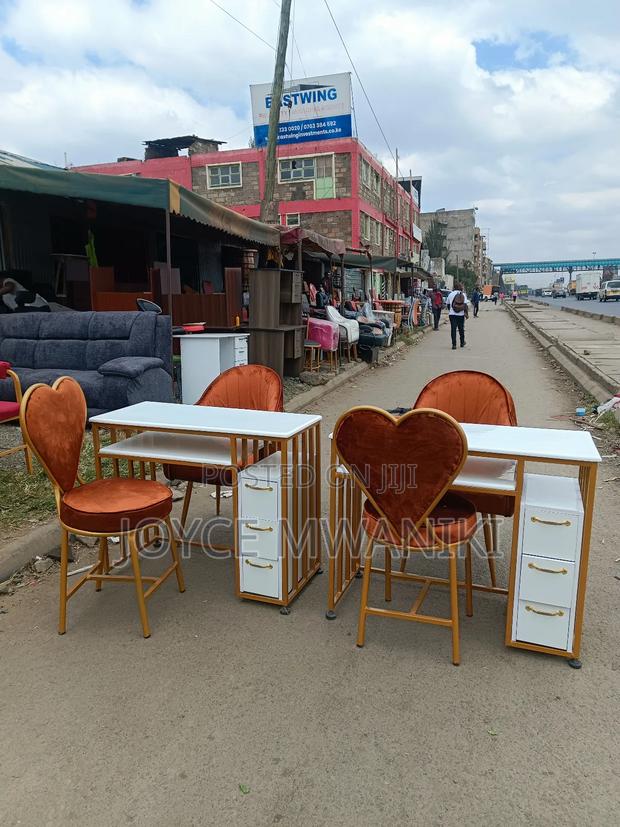 2 Manicure Sets, Burnt Orange Seats, Marble Table  - main view