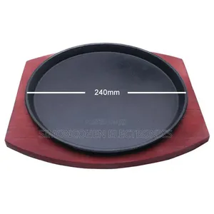 Cast Iron Hot Sizzling Plate on Wooden Tray