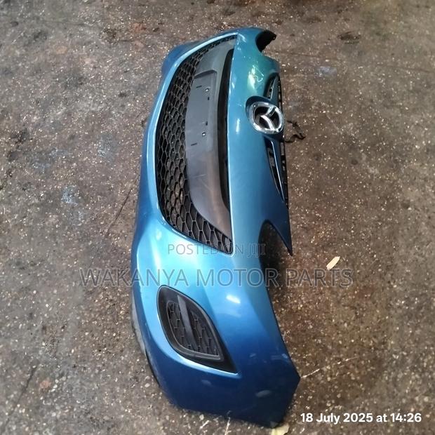 Mazda Demio 2011/2013 Front Bumper Complete, Clean Ex Japan - main view