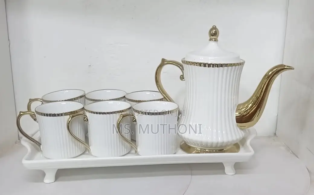 Elegant White 8 PCS White Ceramic Tea Sets With a Gold Rim*