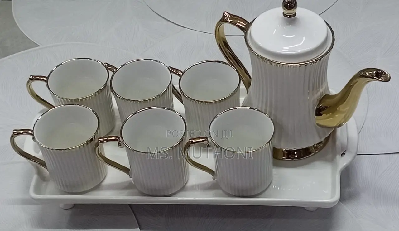 Elegant White 8 PCS White Ceramic Tea Sets With a Gold Rim*
