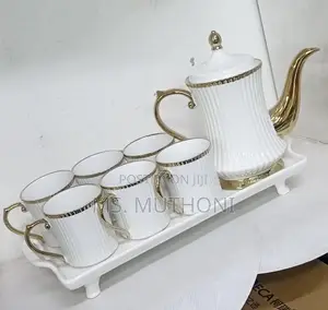 Elegant White 8 PCS White Ceramic Tea Sets With a Gold Rim*
