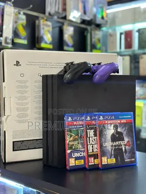 Preowned Ps4 Pro With Games and Two Controllers.