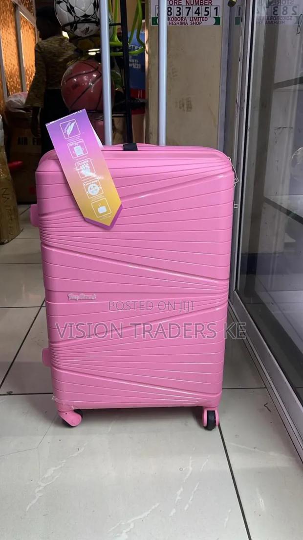 Hot Pink Medium Rubber Suitcase 66cm Height - main view
