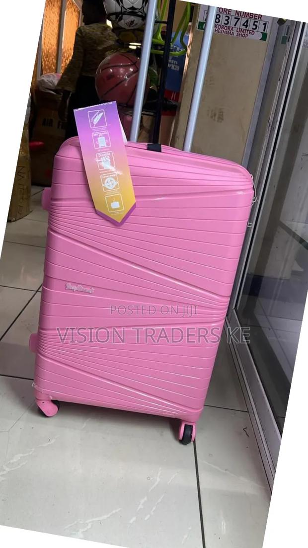 Hot Pink Medium Rubber Suitcase 66cm Height - thumbnail 3