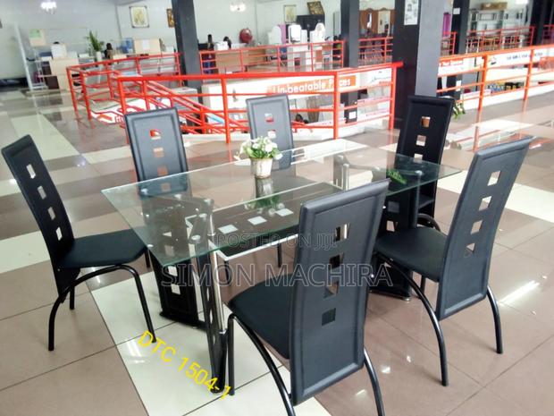 Executive 6 Sitter Glass Dinning Table With Leather Seat