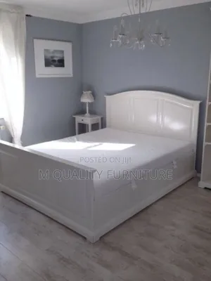 White Wooden Beds