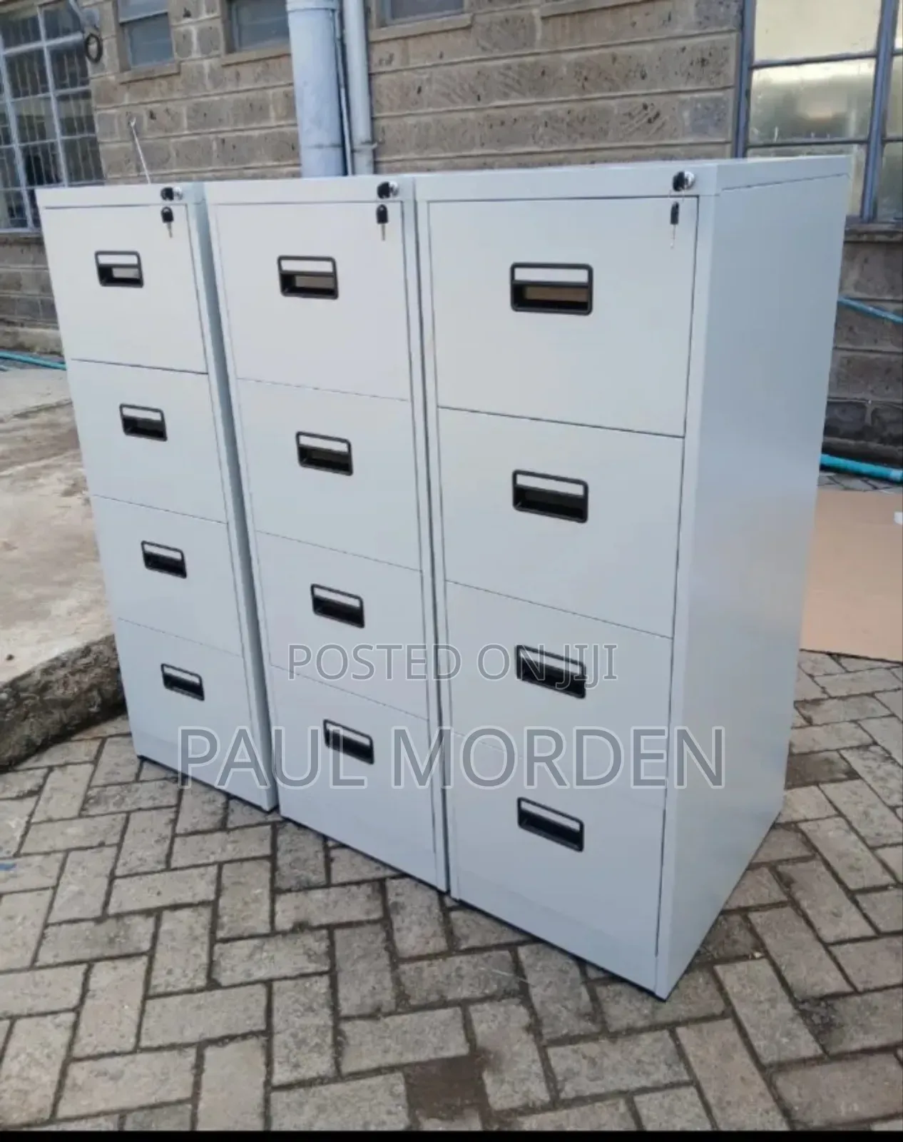 Arrange Four Drawers Metallic Filing Cabinet