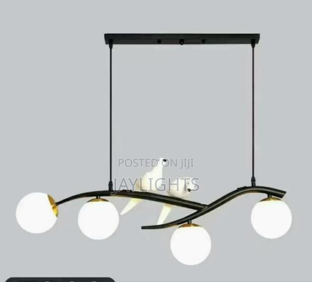 Nature’S Glow: Bird-Inspired Artistic Pendant Light"