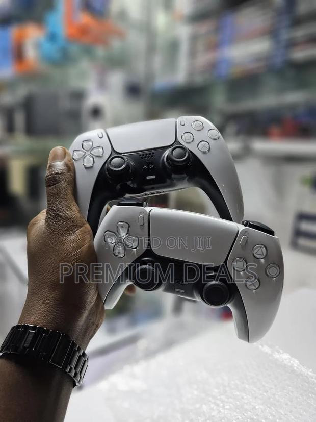 Clean White Ps5 Controllers.