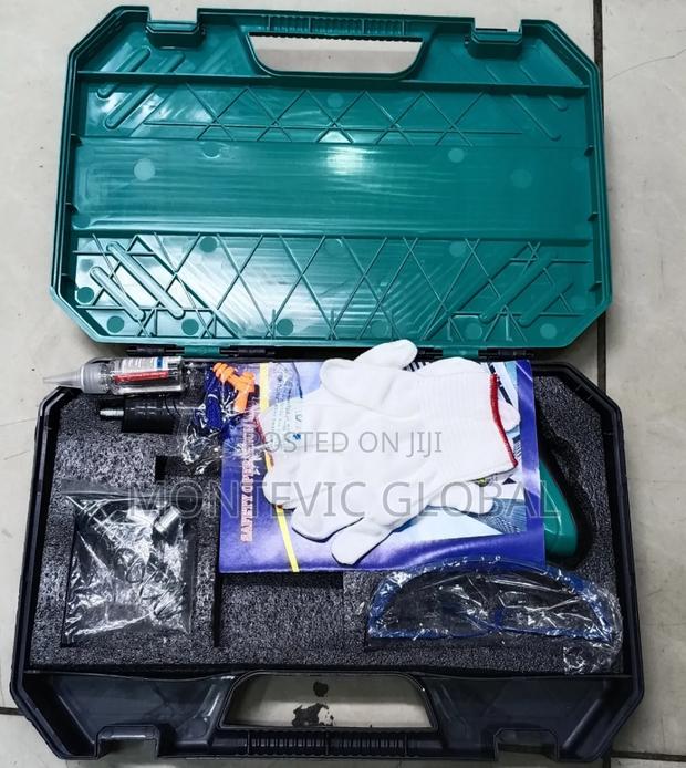 Hand Held Nail Gun
