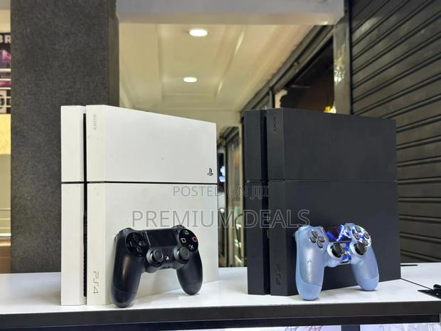 Clean Chipped Ps4 of Your Colour Choice Plus Games.