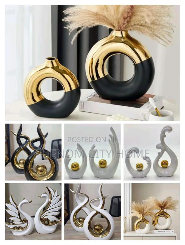 A Pair of Classic Ceramic Decor Items