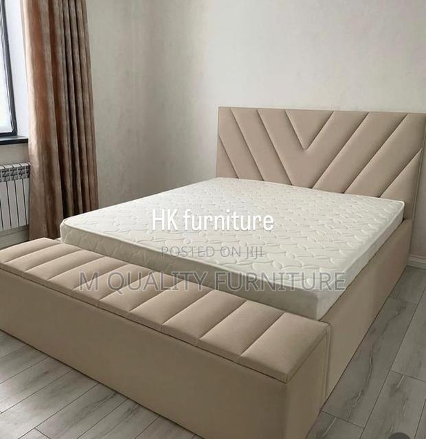 5 by 6 Patterned Bed With Ottoman