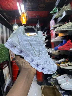 Pure White Nike Shox Sneakers