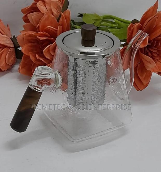 Classy Frosted Glass Tea /Beverage Pot With Bamboo Handle
.