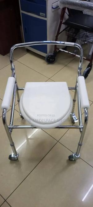 Foldable Commode Chair With Wheels - thumbnail 2