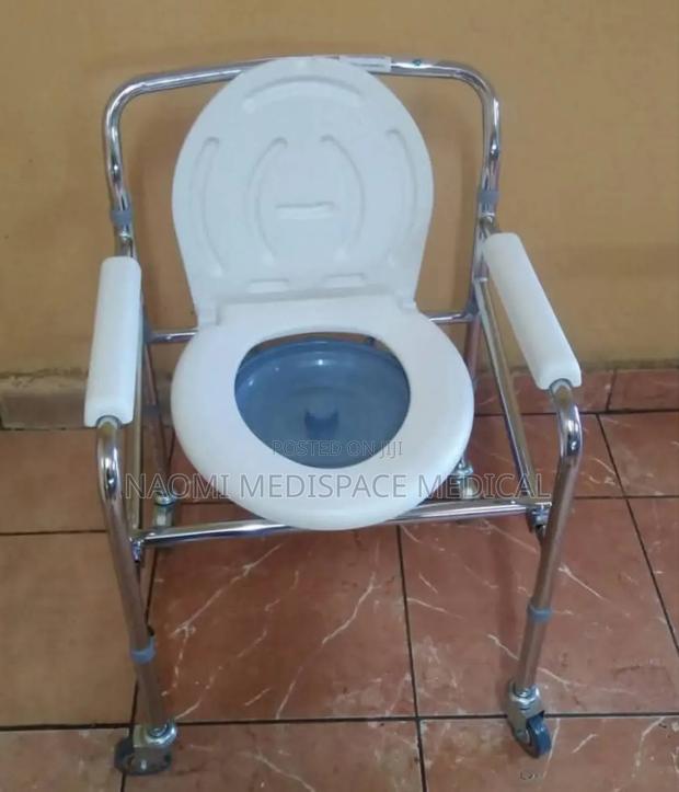 Foldable Commode Chair With Wheels - thumbnail 3