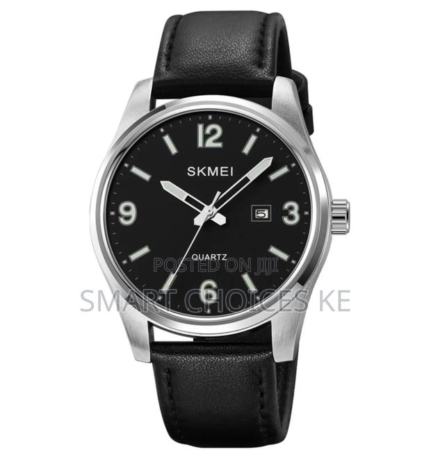 Skmei Unisex
 Leather Strap
 Stainless Steel Face