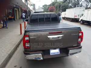 Three Trifold Tri Folding Hard Tri-Fold Bed Cover for Toyota