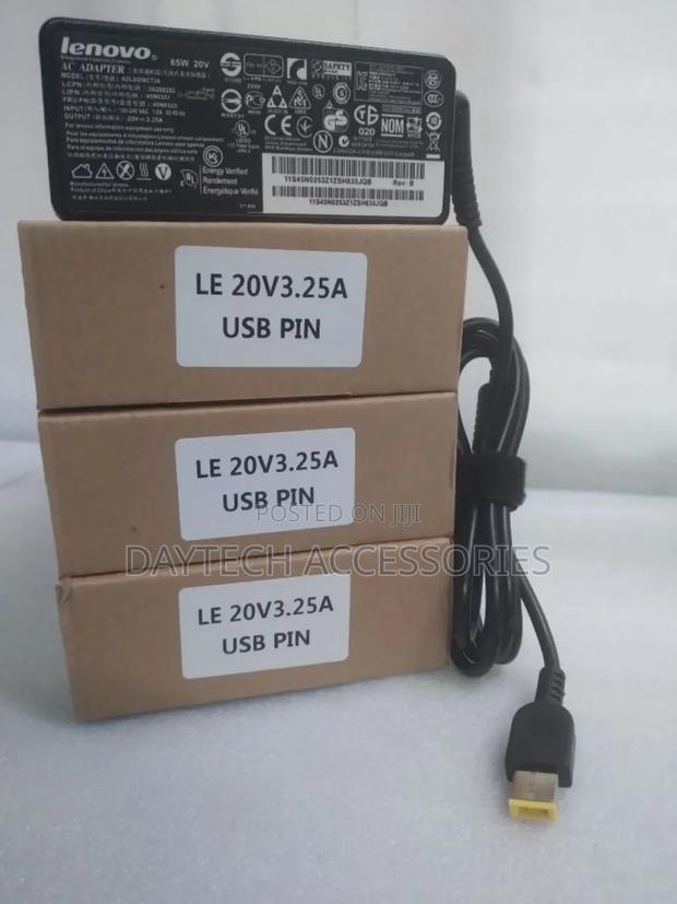 Lenovo 65w Ac Adapter With a Usb Pin Connector.