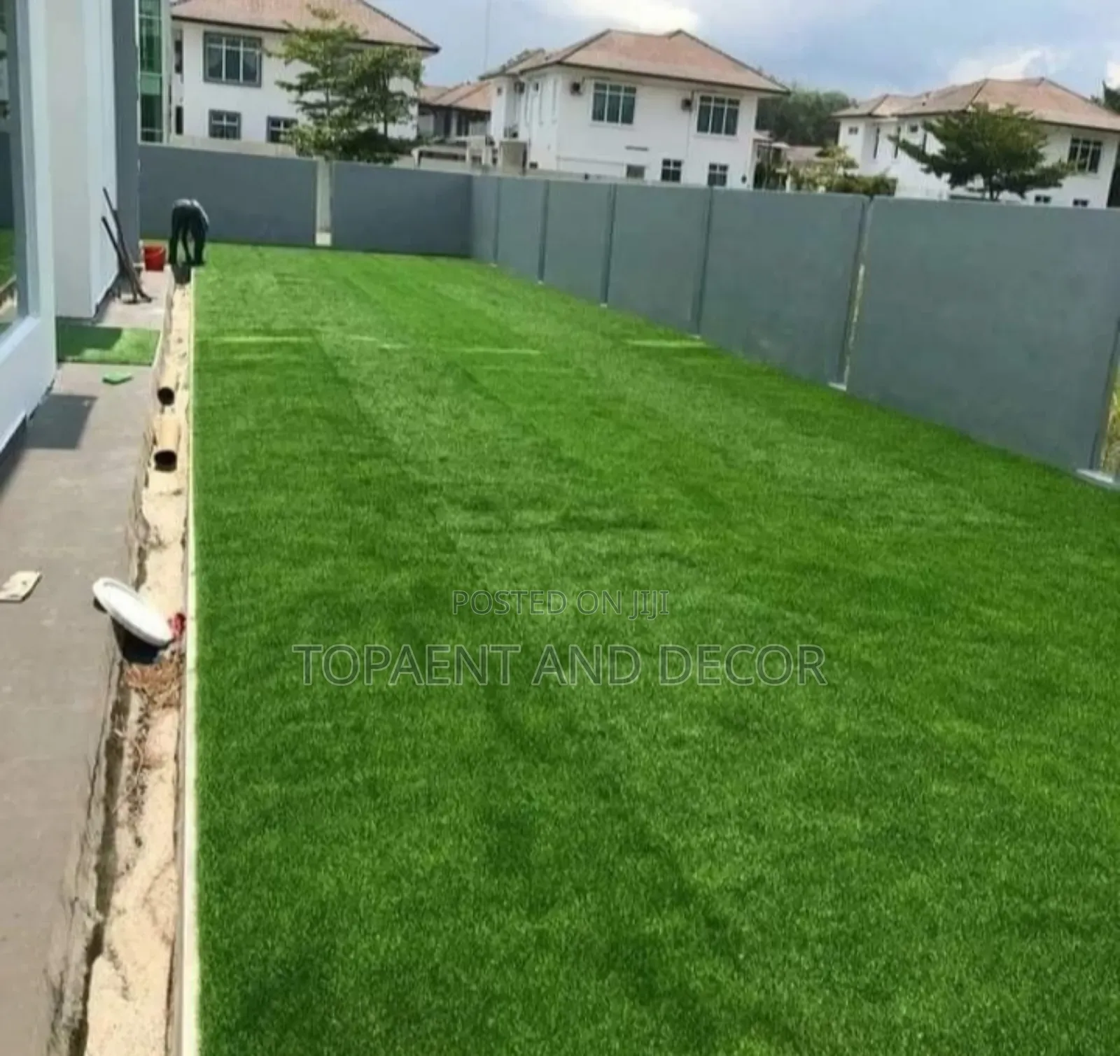Nice Home Backyard Corridor With Artificial Grass Carpet