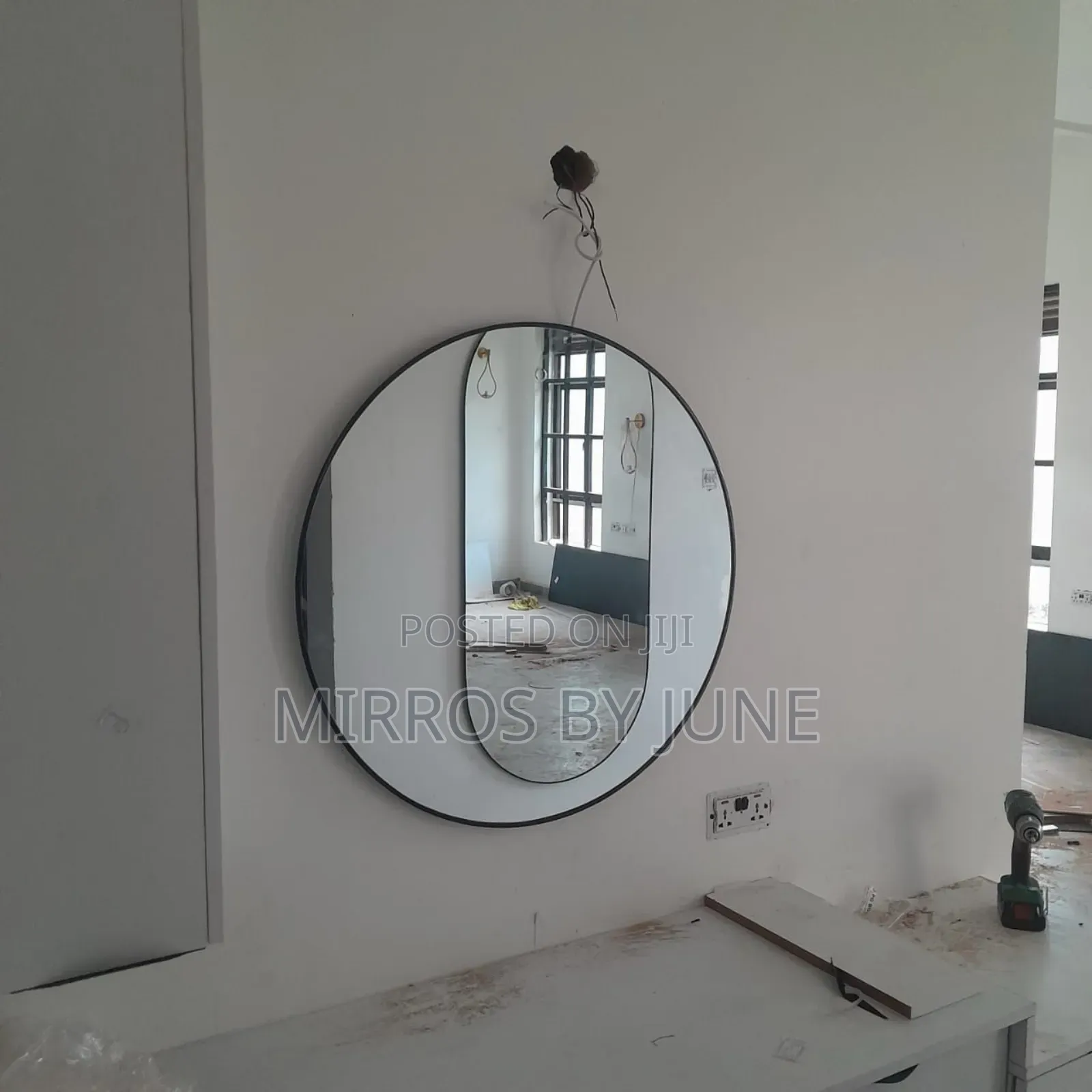 Round Black Framed Mirror