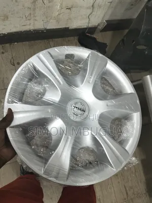 Brand New Nissan Size 15 Wheel Caps (With Logo)