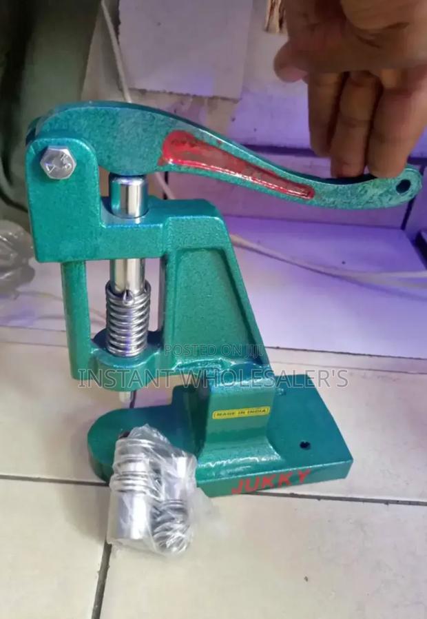 Button Press Juki Machine