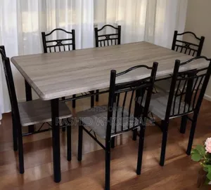 New 6 Sitter Dining Table Brown.,