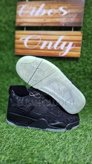 Jordan 4 Kaws "Black"