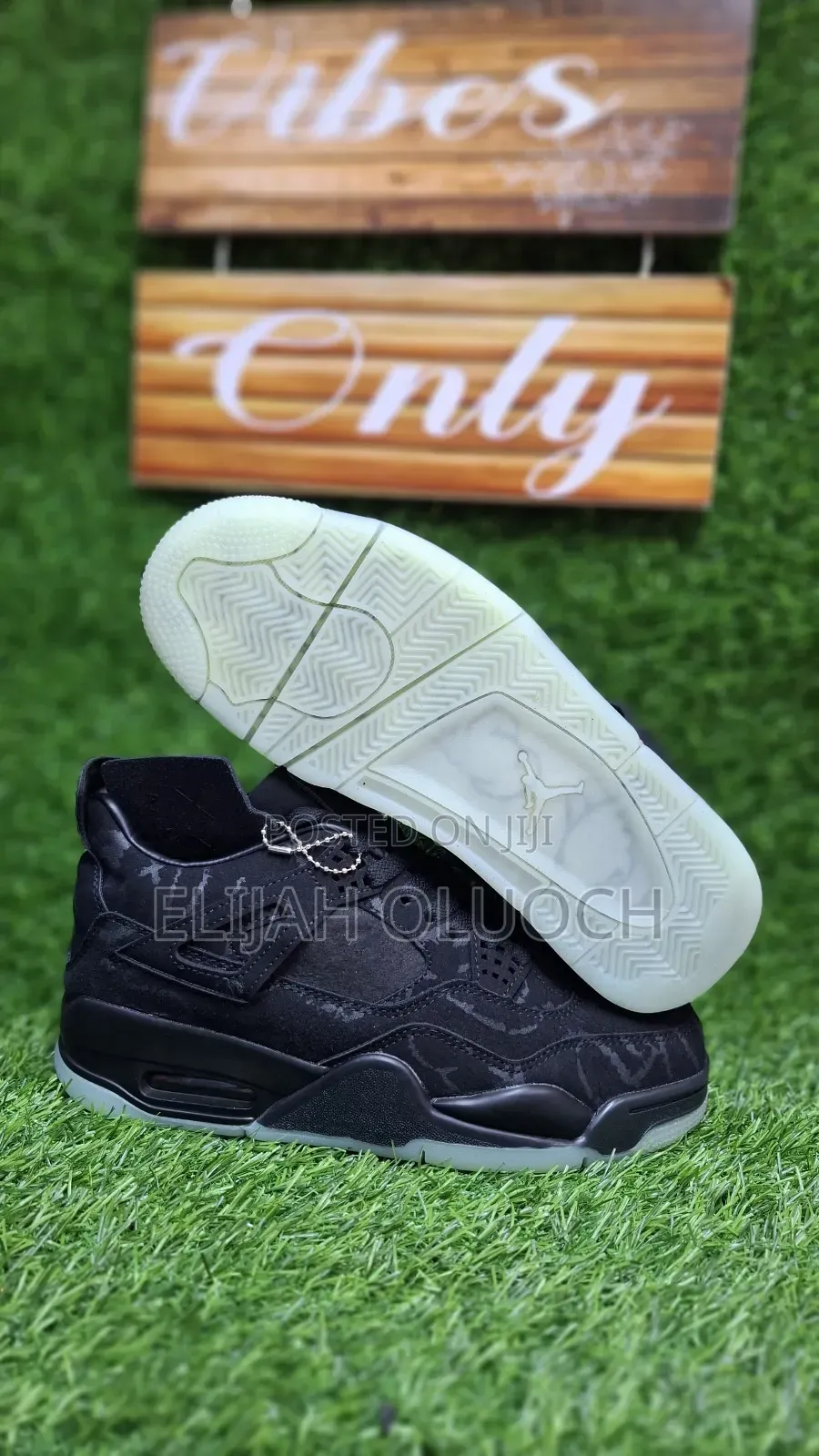 Jordan 4 Kaws "Black"